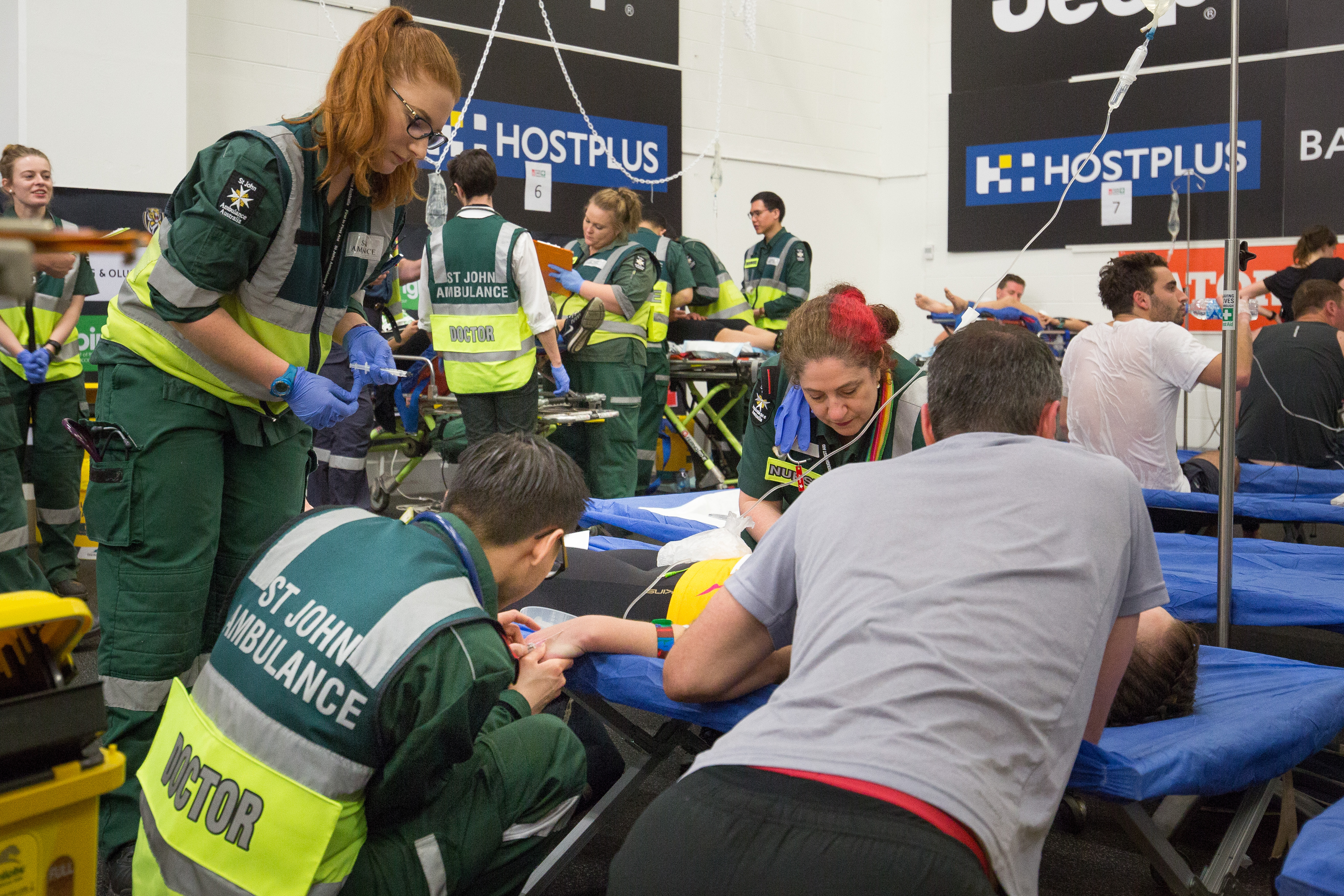 St John first aid at events volunteers tending to a patient