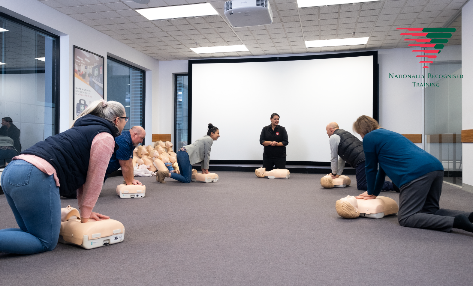 Group of first aid training participants socially distanced